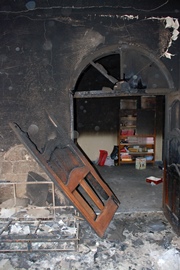 A burned-out home in Homs