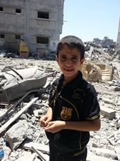 A boy among the ruins - destruction in Gaza City