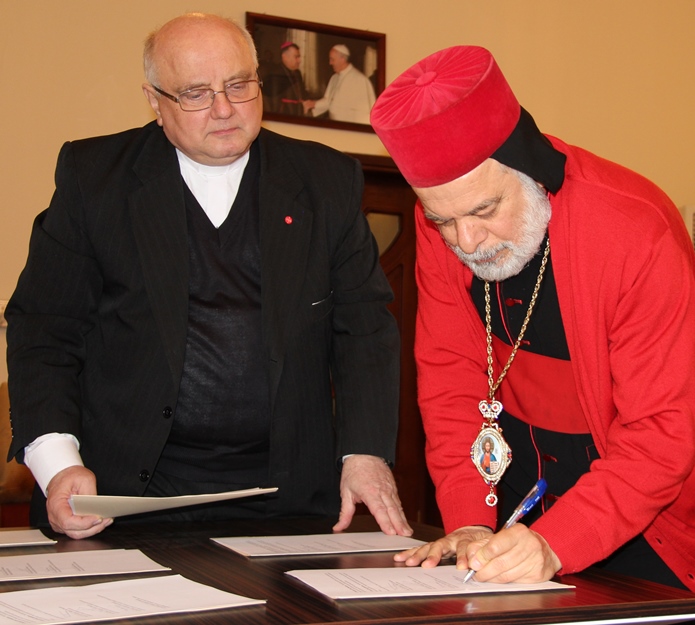Archbishop Mousa Al-Shamani and Father Halemba.2.jpg