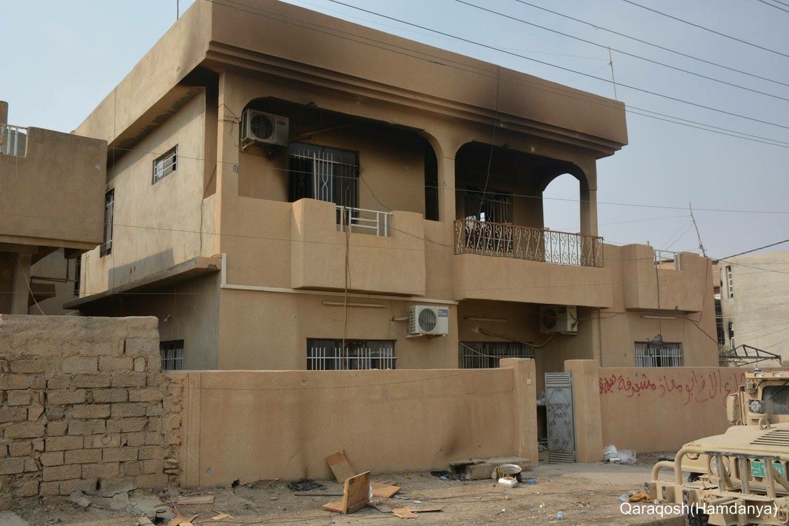 Damaged Christian home in Qaraoqosh, Nineveh Plain.jpg