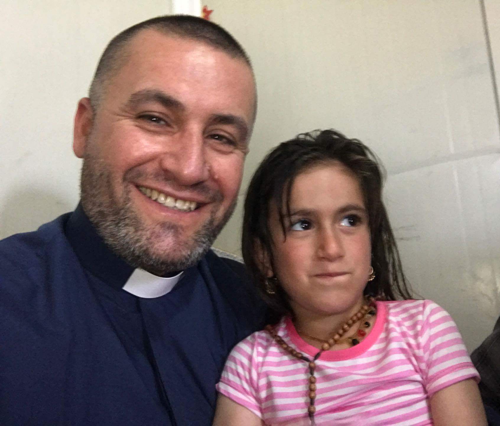 Iraq_Father Ignatius Offy_Christina Ezzo.jpeg
