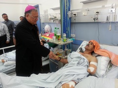 Latin Patriach Twal visiting war victims from Gaza