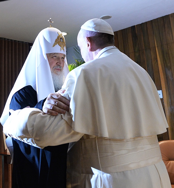 Patriarch and Pope embrace.jpg