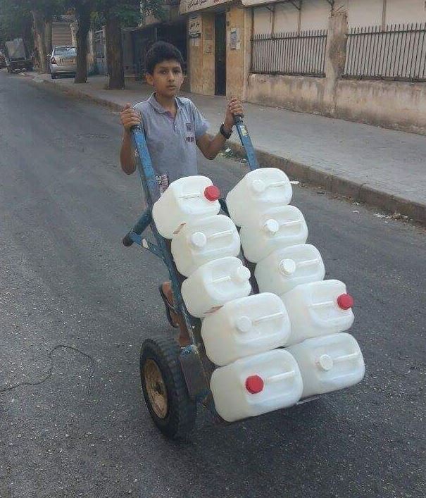 Scrambling for water in Aleppo, Syria.jpg