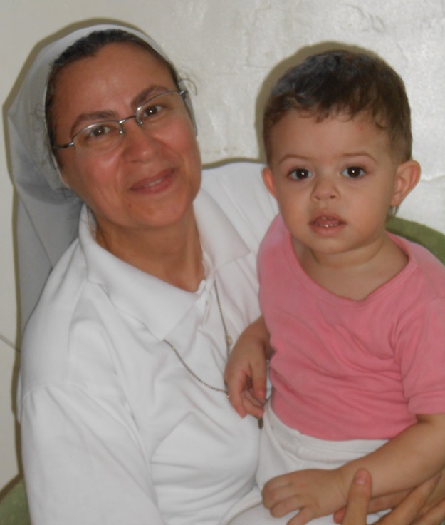 Sister Annie Demerjian with one of her charges in Aleppo.sma
