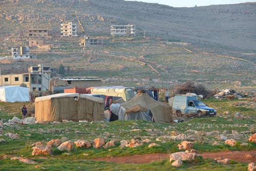 Syrian refugees in the village of Kaa.jpg